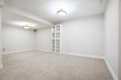 44 Vandoos Gardens Nw, Calgary, AB - Indoor Photo Showing Other Room