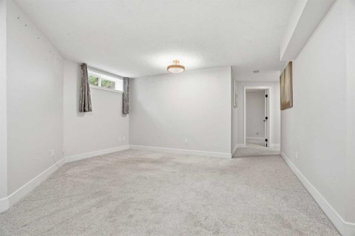 44 Vandoos Gardens Nw, Calgary, AB - Indoor Photo Showing Other Room