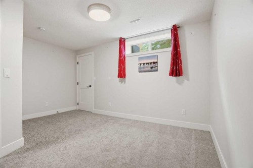 44 Vandoos Gardens Nw, Calgary, AB - Indoor Photo Showing Other Room