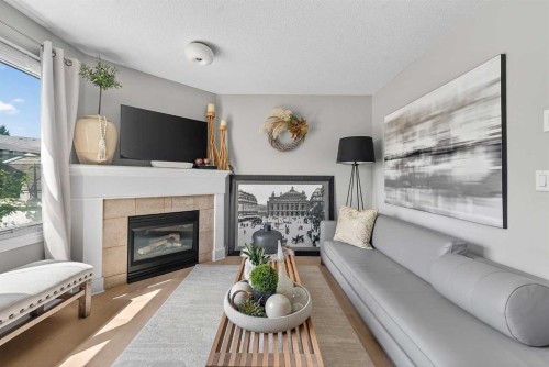 2275 Flanders Avenue Sw, Calgary, AB - Indoor Photo Showing Living Room With Fireplace
