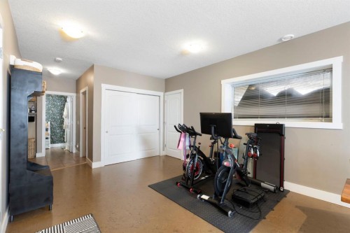128 Hillcrest Cape, Strathmore, AB - Indoor Photo Showing Gym Room