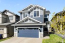 75 Sundown Crescent, Cochrane, AB  - Outdoor With Facade 