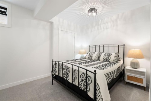 75 Sundown Crescent, Cochrane, AB - Indoor Photo Showing Bedroom