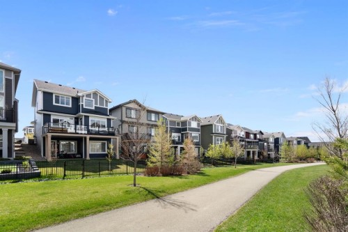 75 Sundown Crescent, Cochrane, AB - Outdoor With Facade