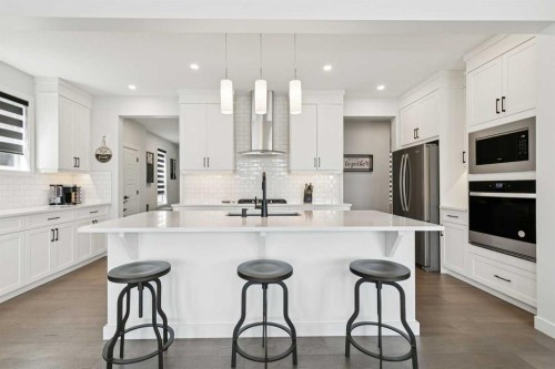 160 Precedence Hill, Cochrane, AB - Indoor Photo Showing Kitchen With Upgraded Kitchen