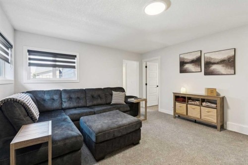 160 Precedence Hill, Cochrane, AB - Indoor Photo Showing Living Room