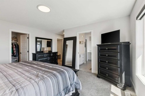160 Precedence Hill, Cochrane, AB - Indoor Photo Showing Bedroom