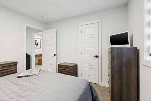 160 Precedence Hill, Cochrane, AB - Indoor Photo Showing Bedroom