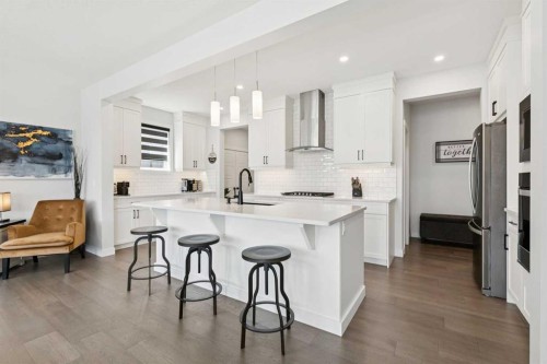 160 Precedence Hill, Cochrane, AB - Indoor Photo Showing Kitchen With Upgraded Kitchen