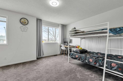 300 Copperstone Cove Se, Calgary, AB - Indoor Photo Showing Bedroom