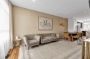 300 Copperstone Cove Se, Calgary, AB  - Indoor Photo Showing Living Room 