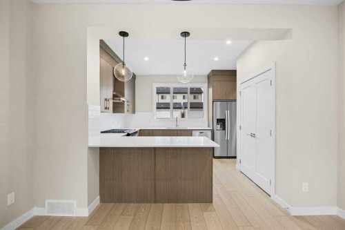 536 Chelsea Gardens, Chestermere, AB - Indoor Photo Showing Kitchen