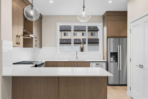 536 Chelsea Gardens, Chestermere, AB - Indoor Photo Showing Kitchen With Upgraded Kitchen