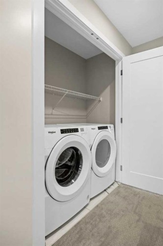 536 Chelsea Gardens, Chestermere, AB - Indoor Photo Showing Laundry Room