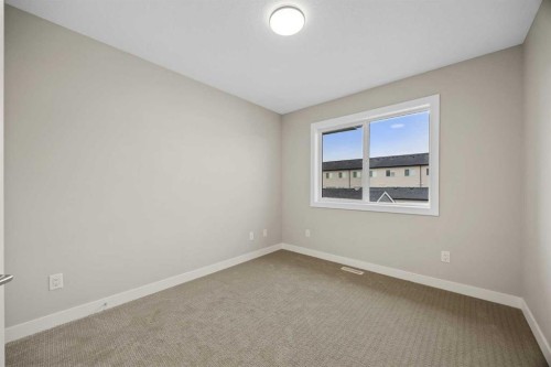 536 Chelsea Gardens, Chestermere, AB - Indoor Photo Showing Other Room