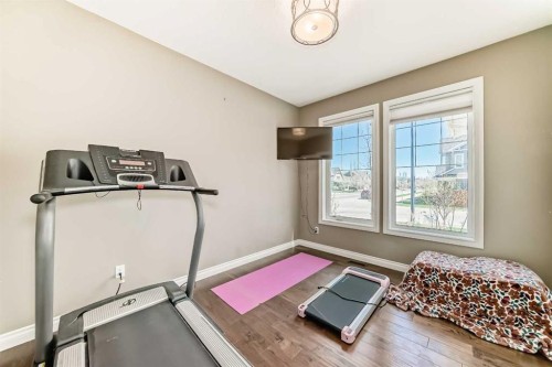 7 Westland Manor Sw, Calgary, AB - Indoor Photo Showing Gym Room