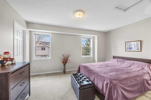 33 Country Hills Cove Nw, Calgary, AB - Indoor Photo Showing Bedroom