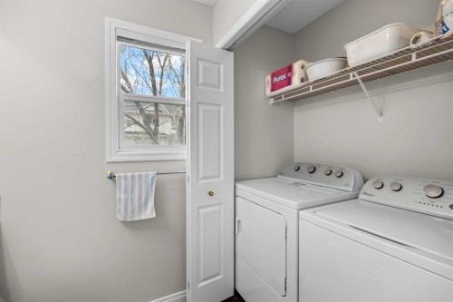 33 Country Hills Cove Nw, Calgary, AB - Indoor Photo Showing Laundry Room