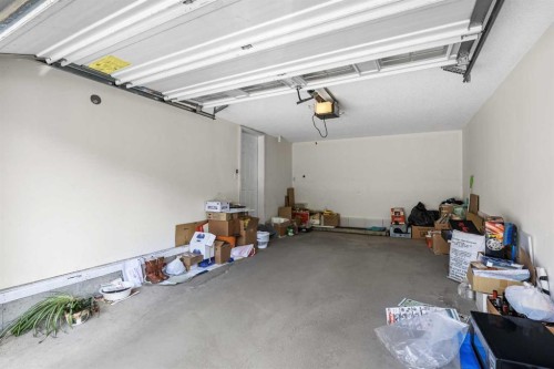 33 Country Hills Cove Nw, Calgary, AB - Indoor Photo Showing Garage