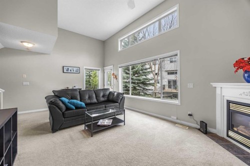 33 Country Hills Cove Nw, Calgary, AB - Indoor With Fireplace