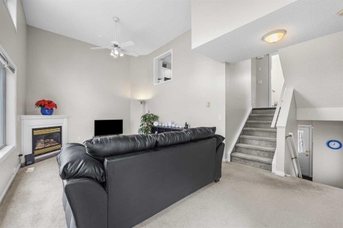 33 Country Hills Cove Nw, Calgary, AB - Indoor With Fireplace