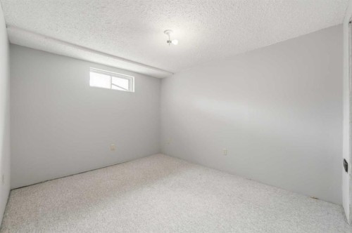 85 Cedarwood Hill Sw, Calgary, AB - Indoor Photo Showing Other Room