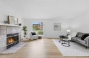 85 Cedarwood Hill Sw, Calgary, AB  - Indoor Photo Showing Living Room With Fireplace 