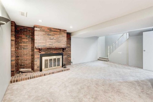 9728 Alberni Road Se, Calgary, AB - Indoor With Fireplace