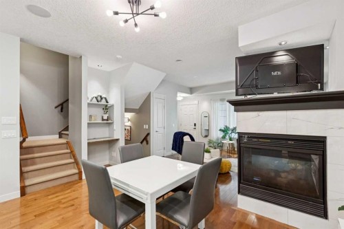 1-528 34 Street Nw, Calgary, AB - Indoor With Fireplace