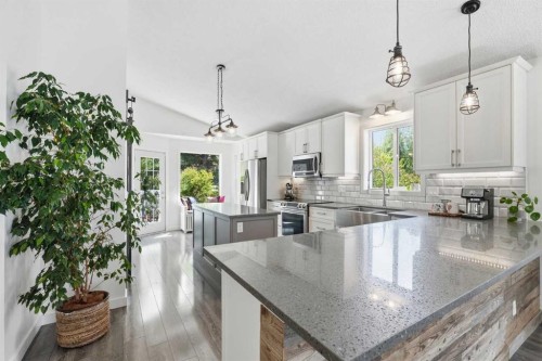 10 Shawbrooke Rise Sw, Calgary, AB - Indoor Photo Showing Kitchen With Double Sink With Upgraded Kitchen
