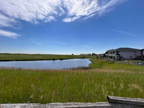 596 Muirfield Crescent, Lyalta, AB - Outdoor With Body Of Water With View