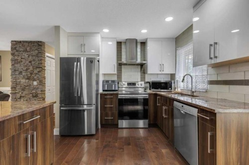 155 Midcrest Crescent Se, Calgary, AB - Indoor Photo Showing Kitchen With Stainless Steel Kitchen With Upgraded Kitchen