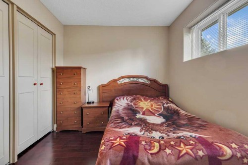 155 Midcrest Crescent Se, Calgary, AB - Indoor Photo Showing Bedroom