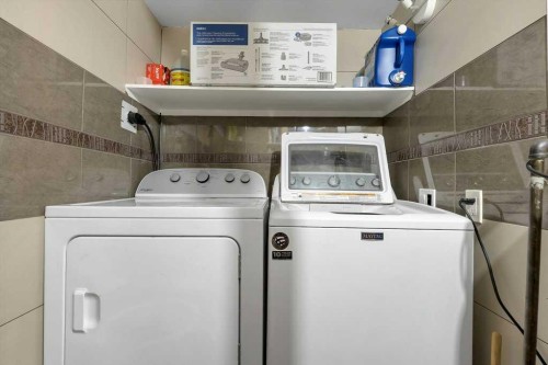 155 Midcrest Crescent Se, Calgary, AB - Indoor Photo Showing Laundry Room