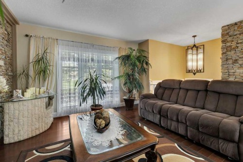 155 Midcrest Crescent Se, Calgary, AB - Indoor Photo Showing Living Room