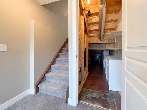 117 Panatella Hill Nw, Calgary, AB - Indoor Photo Showing Other Room
