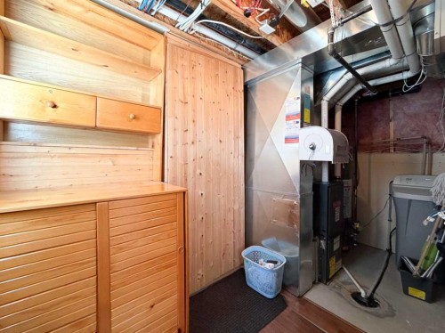 117 Panatella Hill Nw, Calgary, AB - Indoor Photo Showing Basement