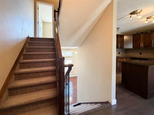 117 Panatella Hill Nw, Calgary, AB - Indoor Photo Showing Other Room
