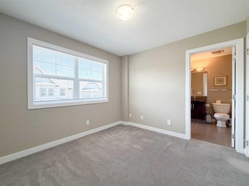 117 Panatella Hill Nw, Calgary, AB - Indoor Photo Showing Other Room