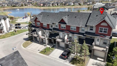 117 Panatella Hill Nw, Calgary, AB - Outdoor With Body Of Water