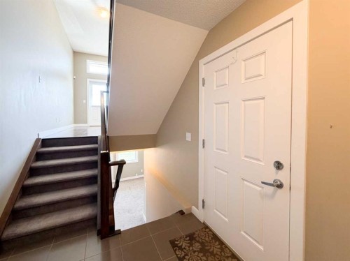 117 Panatella Hill Nw, Calgary, AB - Indoor Photo Showing Other Room