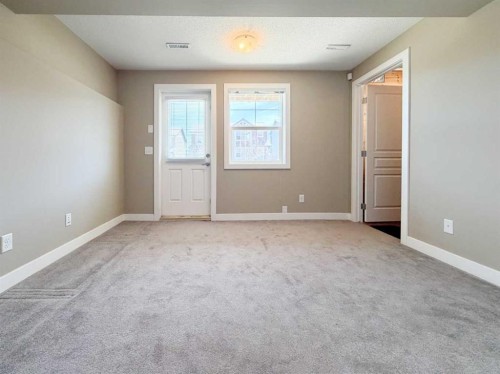 117 Panatella Hill Nw, Calgary, AB - Indoor Photo Showing Other Room