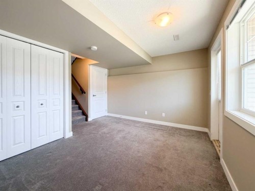 117 Panatella Hill Nw, Calgary, AB - Indoor Photo Showing Other Room