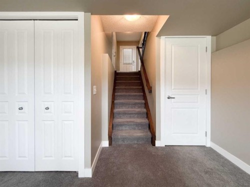 117 Panatella Hill Nw, Calgary, AB - Indoor Photo Showing Other Room