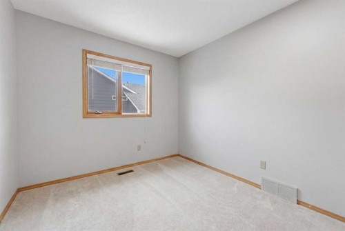 109 Downey Place, Okotoks, AB - Indoor Photo Showing Other Room