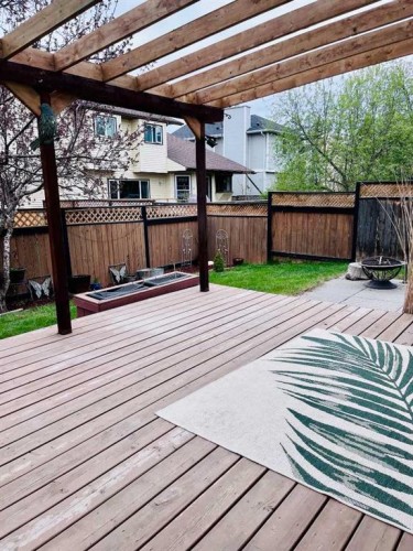109 Downey Place, Okotoks, AB - Outdoor With Deck Patio Veranda
