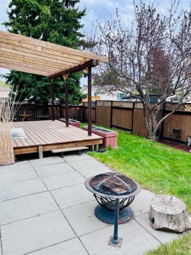 109 Downey Place, Okotoks, AB - Outdoor With Deck Patio Veranda With Backyard