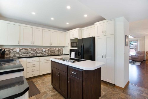 26 Sunhaven Link Se, Calgary, AB - Indoor Photo Showing Kitchen With Double Sink