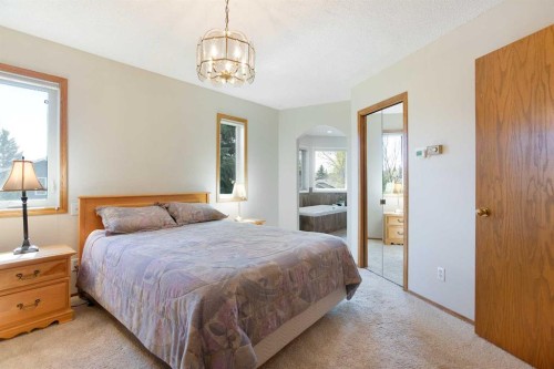 26 Sunhaven Link Se, Calgary, AB - Indoor Photo Showing Bedroom