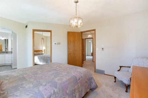 26 Sunhaven Link Se, Calgary, AB - Indoor Photo Showing Bedroom